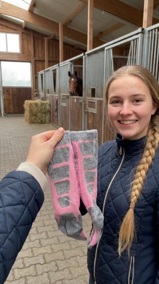 Horse girl showing her new heated riding socks